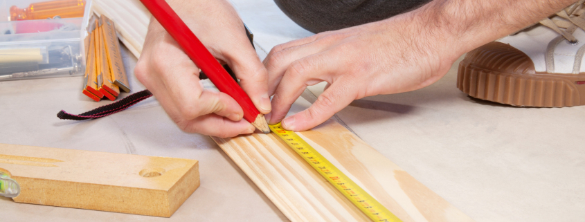 Cropped hand of a carpenter cropped hand of a carpenter